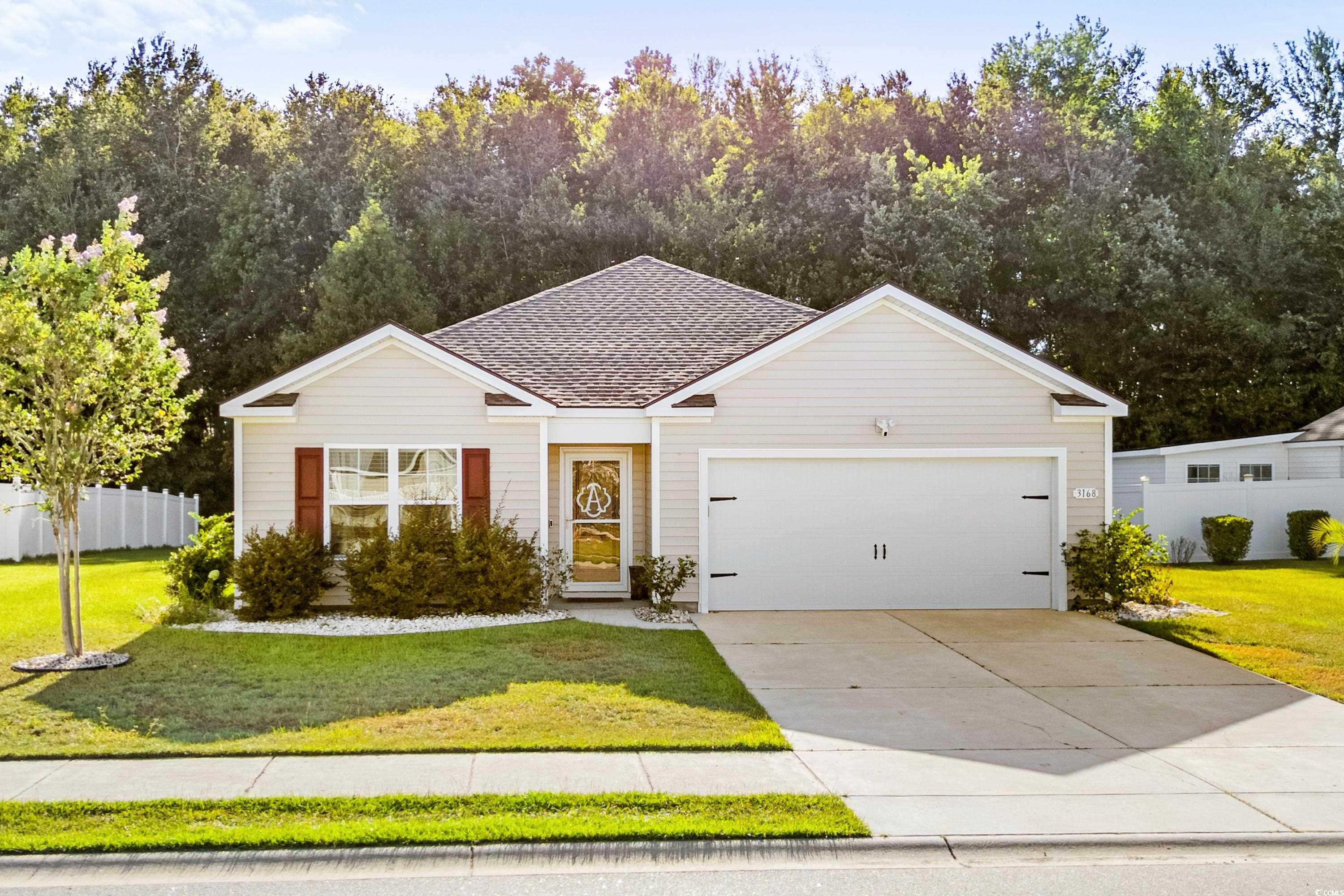 3168 Holly Loop Conway, SC 29527 - Photo 1 of 40 View of front facade featuring a front yard and a