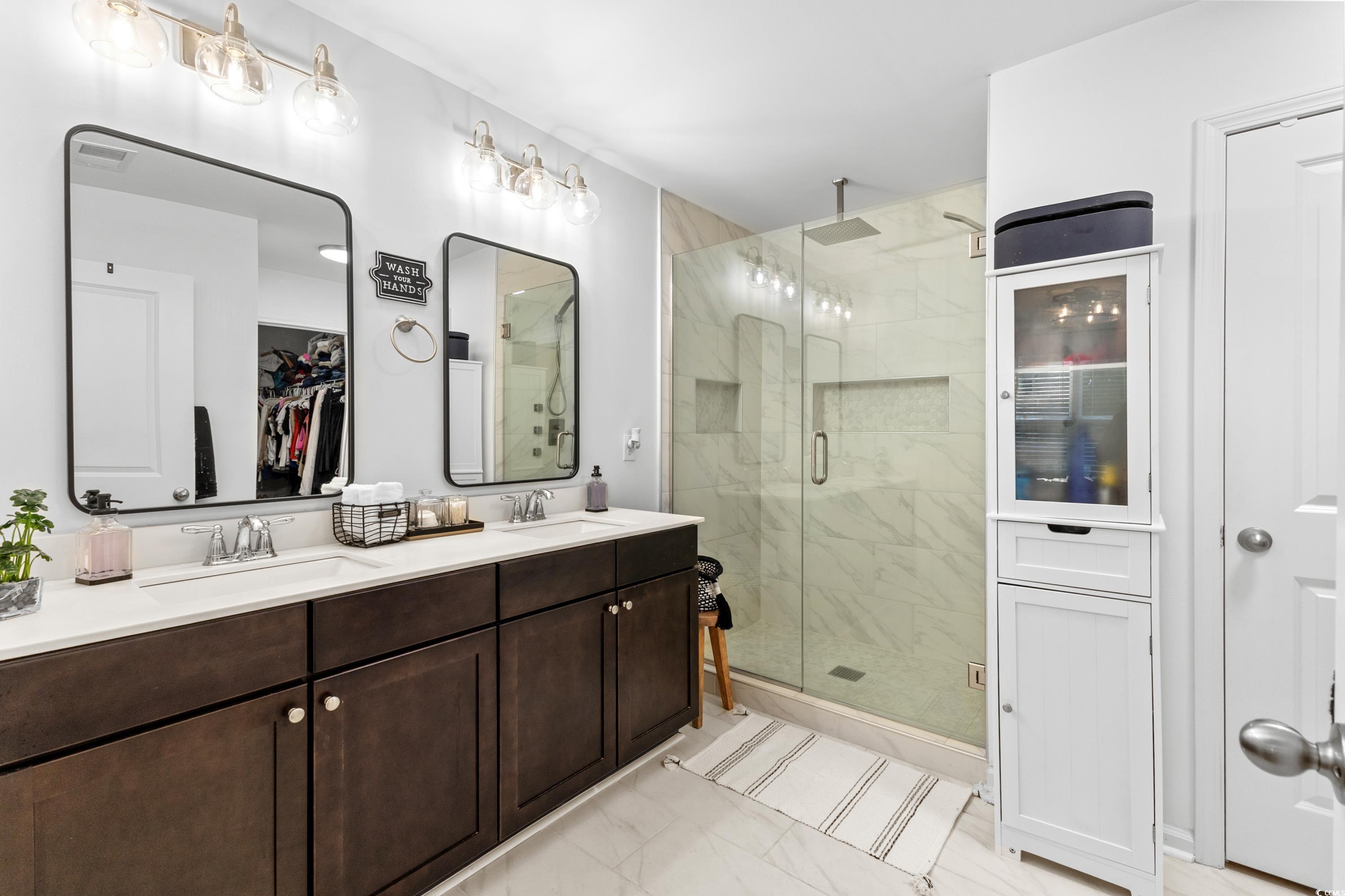 3168 Holly Loop Conway, SC 29527 - Photo 23 of 40 Bathroom with vanity and a shower with shower door