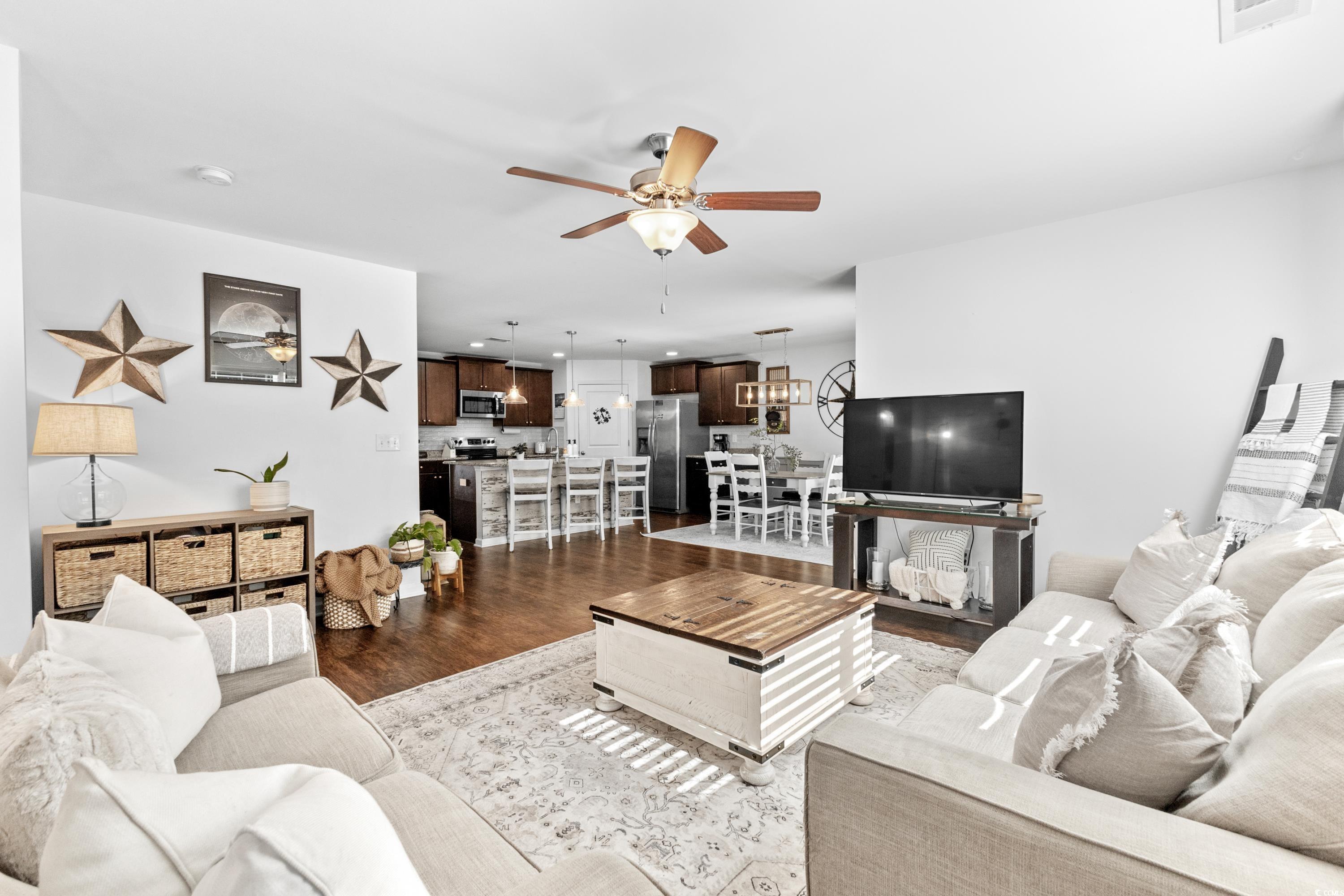 3168 Holly Loop Conway, SC 29527 - Photo 7 of 40 Living room featuring ceiling fan and dark hardwoo