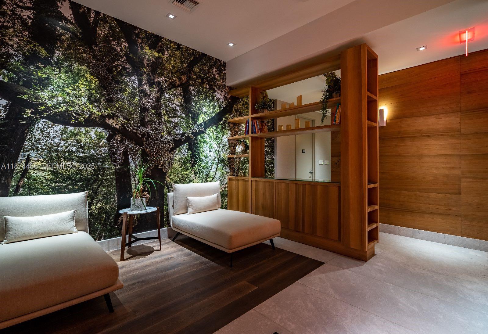 1010 Brickell Avenue, Unit 1902 Miami, FL 33131 - Photo 6 of 12 a balcony with furniture and a potted plant