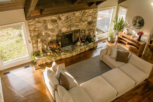 a living room with a couch and a flat screen tv