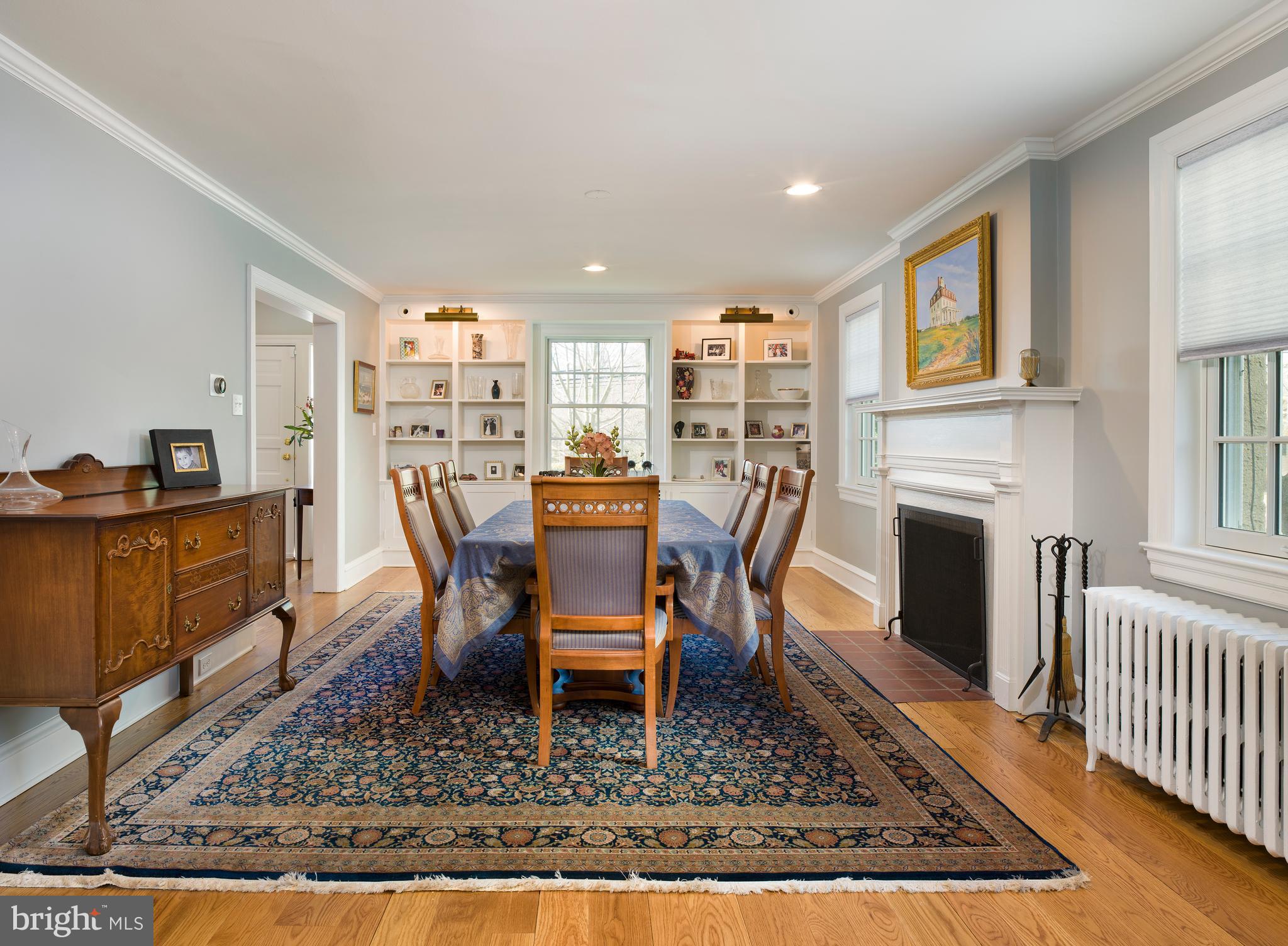 303 West Avenue Wayne, PA 19087 - Photo 12 of 38 Formal dining room with fireplace