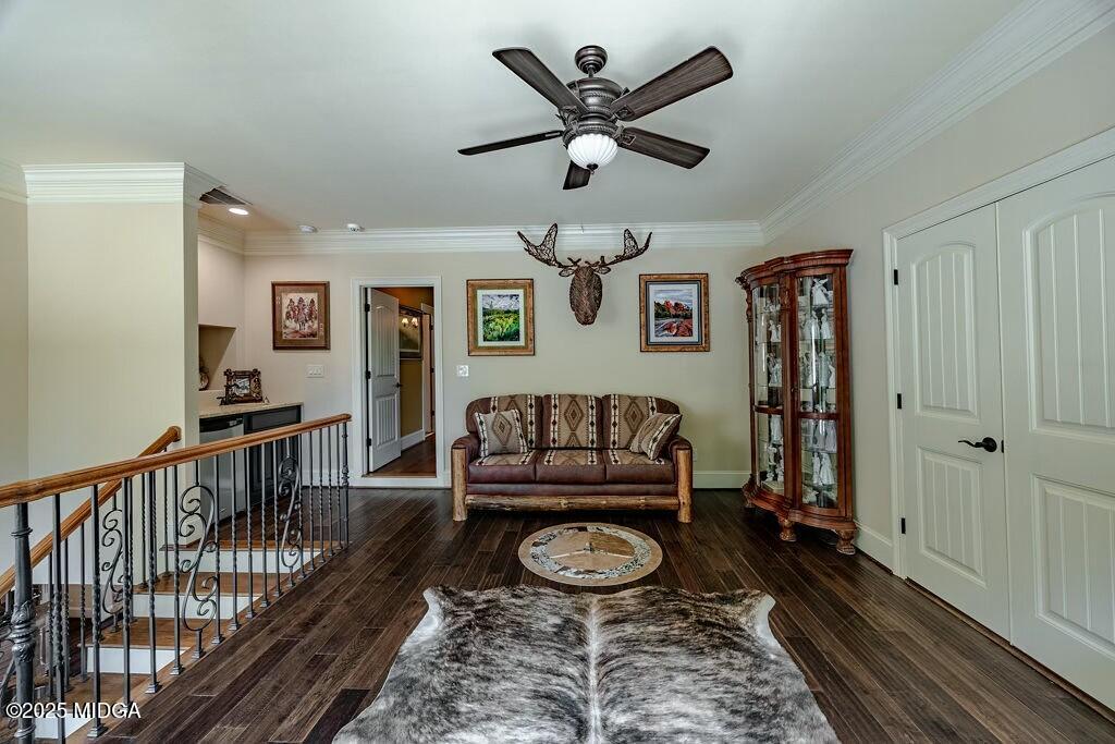 601 River Overlook Forsyth, GA 31029 - Photo 41 of 85 a living room with furniture and a wooden floor