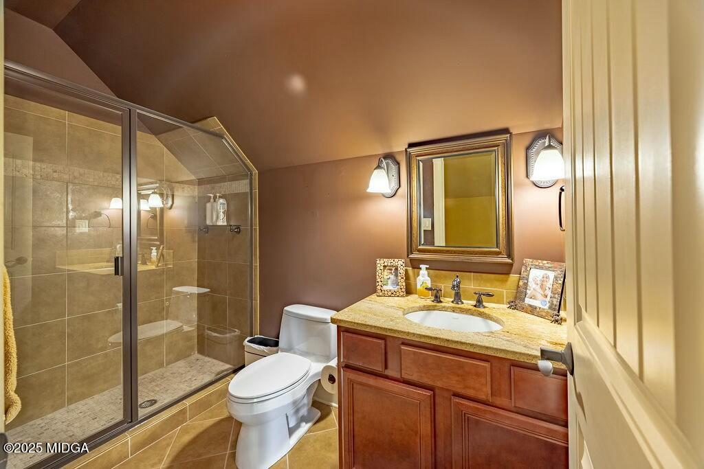 601 River Overlook Forsyth, GA 31029 - Photo 44 of 85 a bathroom with a sink a toilet and shower
