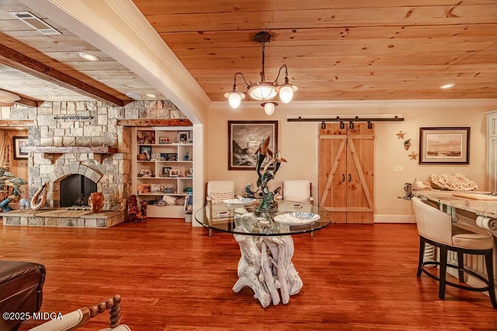 601 River Overlook Forsyth, GA 31029 - Photo 49 of 85 a living room with fireplace furniture and a wooden floor