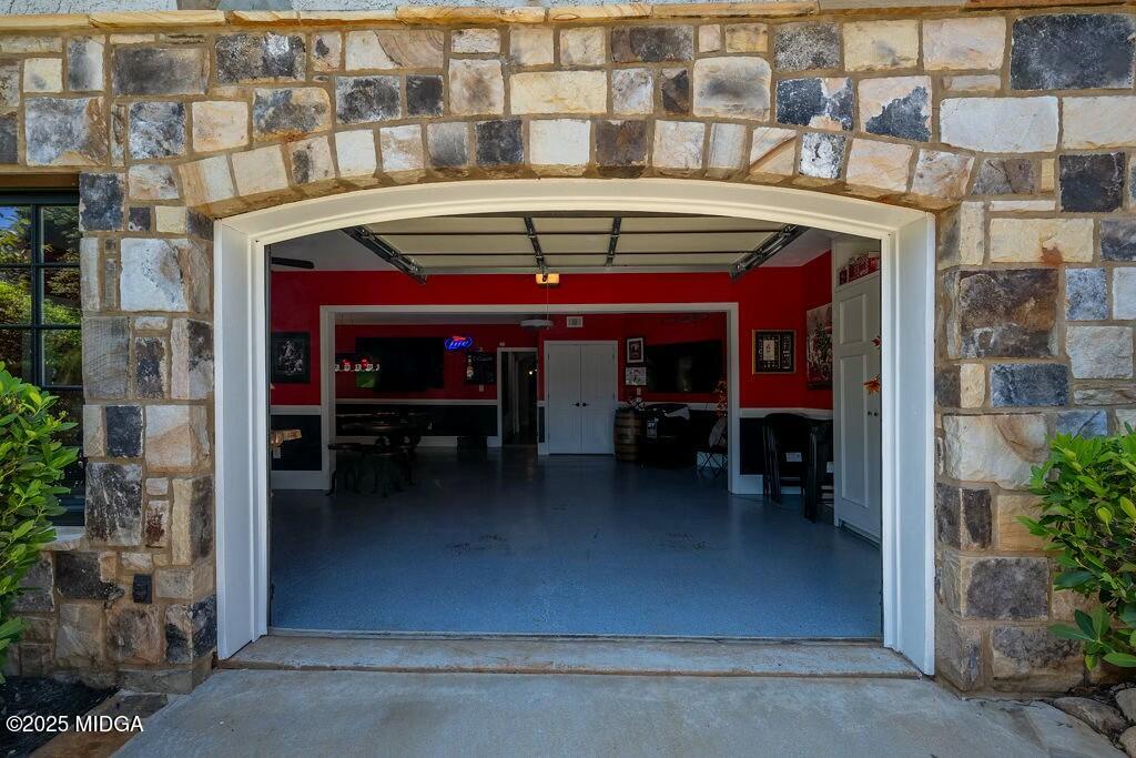 601 River Overlook Forsyth, GA 31029 - Photo 65 of 85 a view of a cafe with a table and chairs