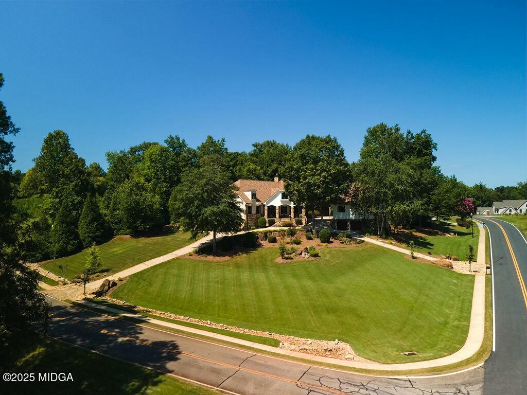 601 River Overlook Forsyth, GA 31029 - Photo 76 of 85 a view of a swimming pool with a yard