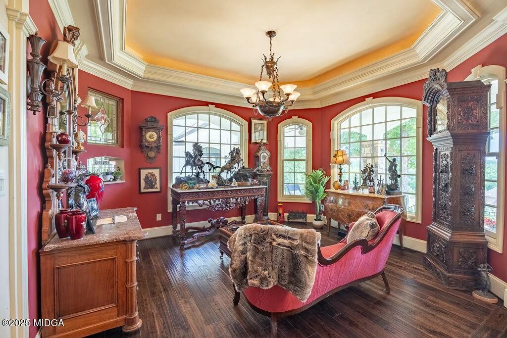 601 River Overlook Forsyth, GA 31029 - Photo 10 of 85 a living room with furniture a chandelier and a large window