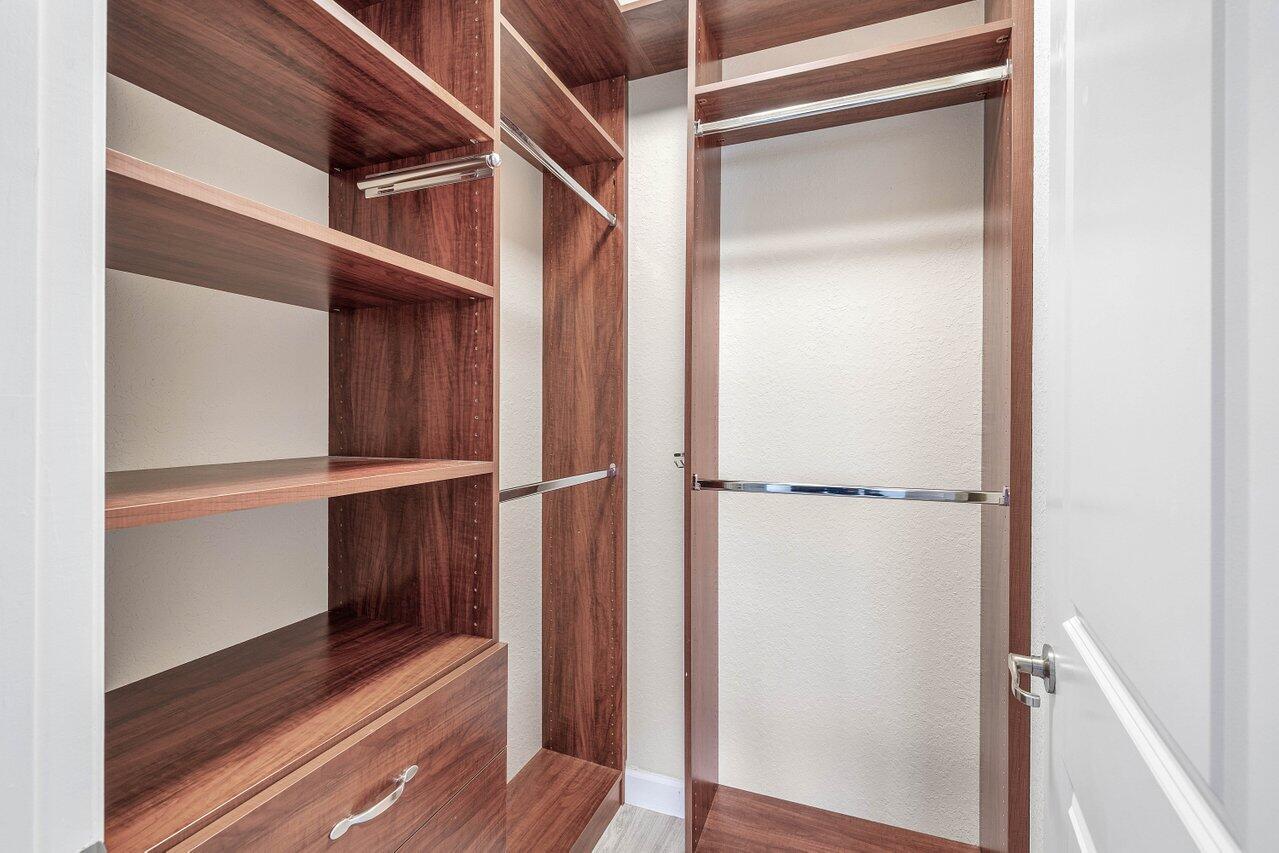 48 Northwest Hawthorne Place Boca Raton, FL 33432 - Photo 30 of 35 Custom Built-In Closet