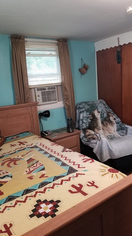 15 Royal Street Springfield, MA 01109 - Photo 21 of 21 a bedroom with a bed and a window