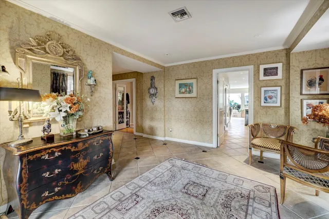 a spacious bathroom with a sink mirror and a bath tub