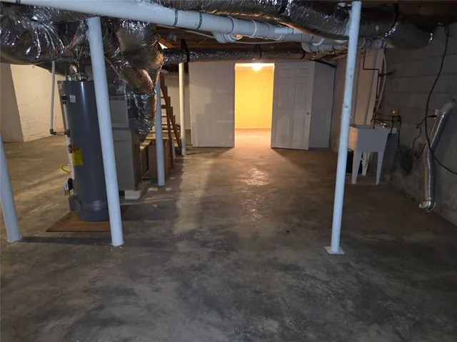 a view of a room with lots of gym equipment