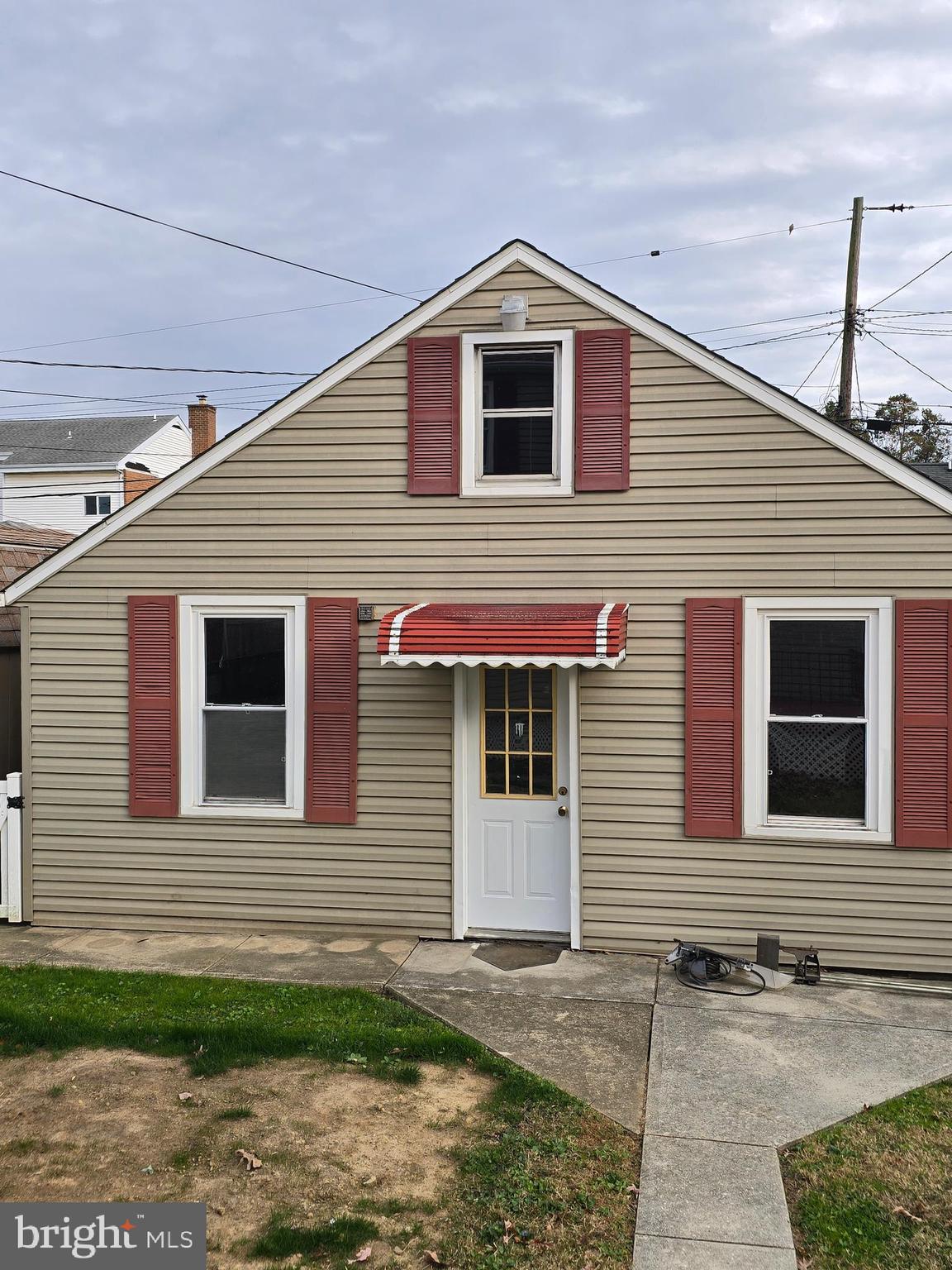 3015 Ritchie Avenue Baltimore, MD 21219 - Photo 16 of 17 a front view of a house with garage
