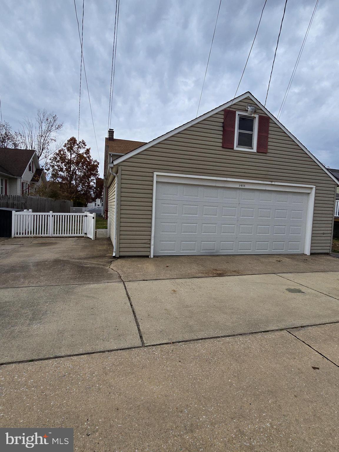 3015 Ritchie Avenue Baltimore, MD 21219 - Photo 17 of 17 a front view of a house with a garage