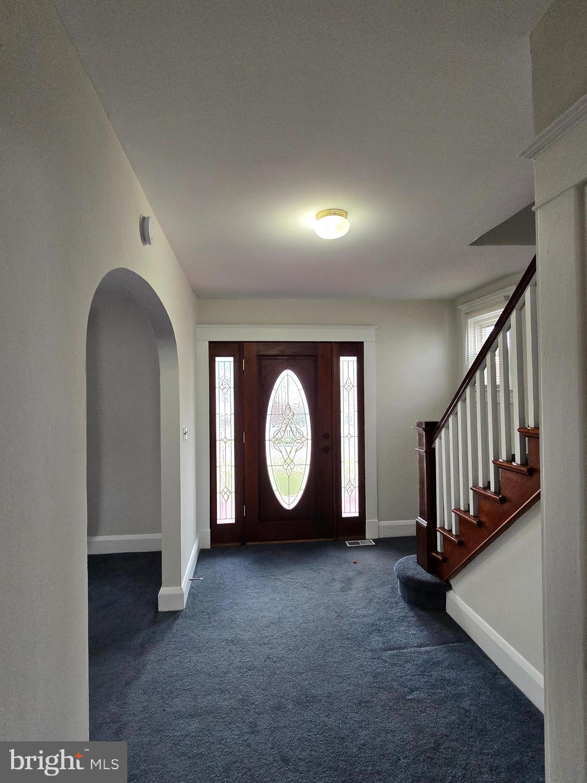 3015 Ritchie Avenue Baltimore, MD 21219 - Photo 2 of 17 a view of a livingroom with a staircase