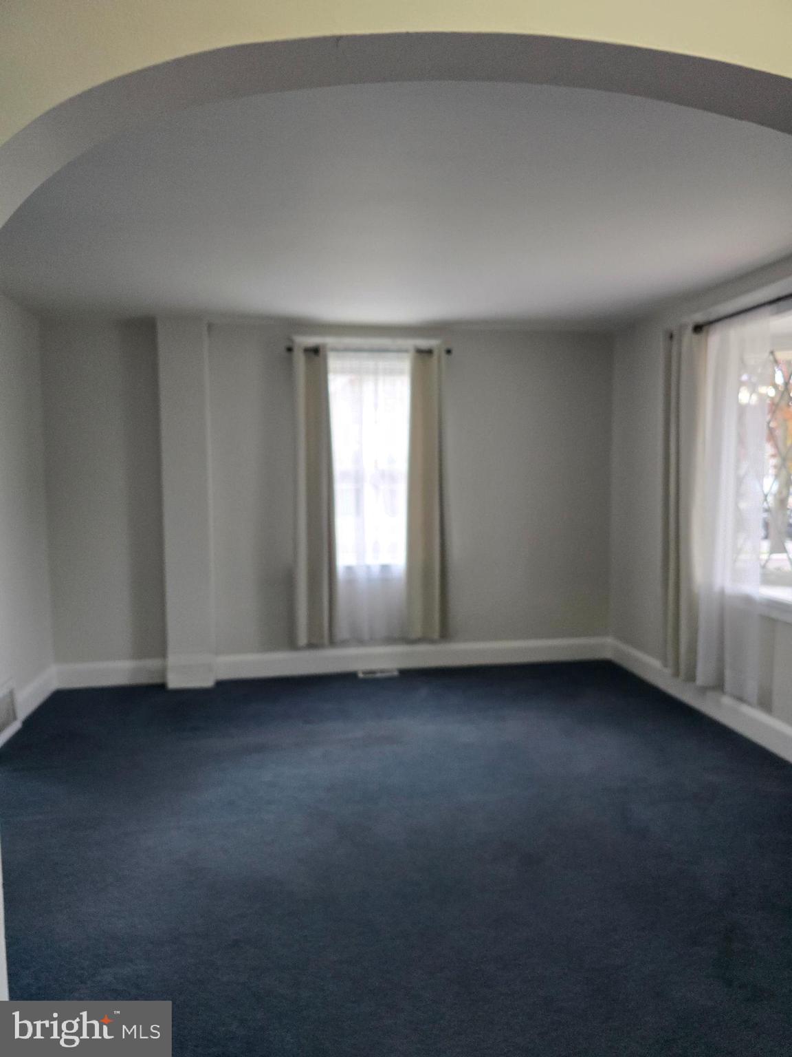 3015 Ritchie Avenue Baltimore, MD 21219 - Photo 4 of 17 an empty room with a window