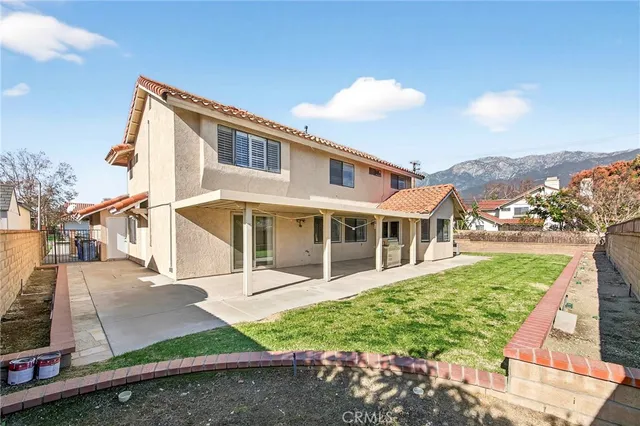an aerial view of residential house and outdoor space