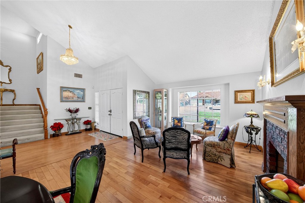 6109 Vineyard Avenue Rancho Cucamonga, CA 91701 - Photo 6 of 22 a living room with furniture and a flat screen tv