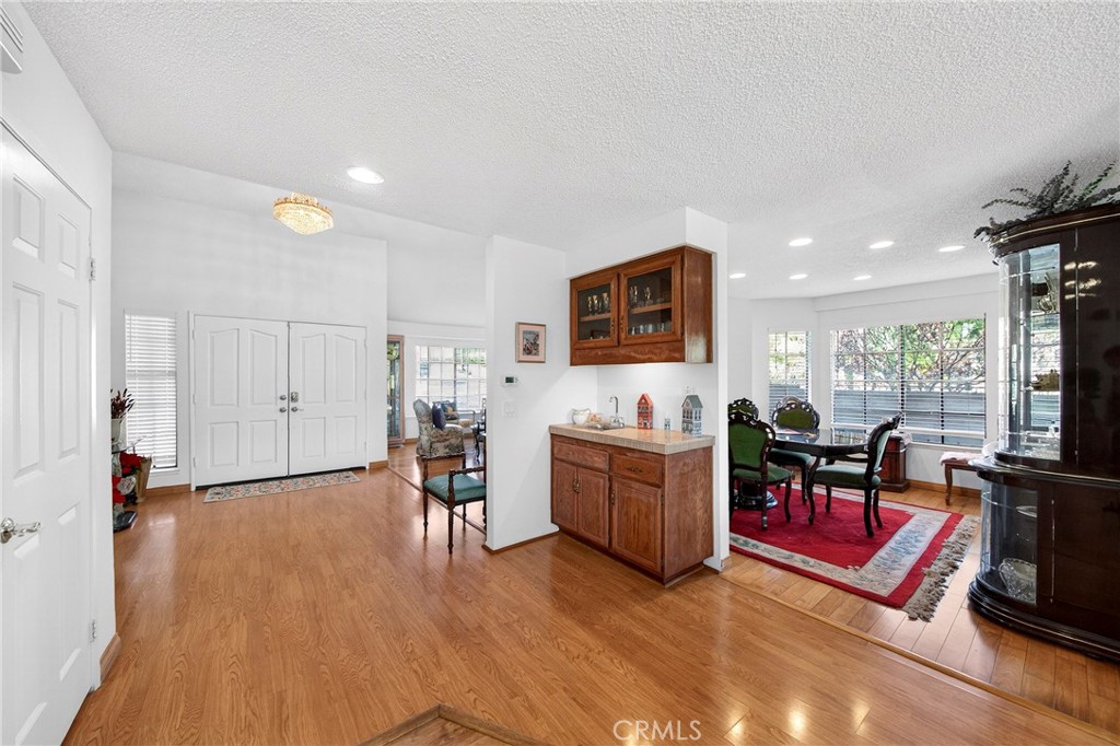 6109 Vineyard Avenue Rancho Cucamonga, CA 91701 - Photo 7 of 22 a living room with furniture and a large window