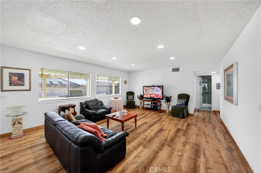 6109 Vineyard Avenue Rancho Cucamonga, CA 91701 - Photo 8 of 22 a living room with furniture