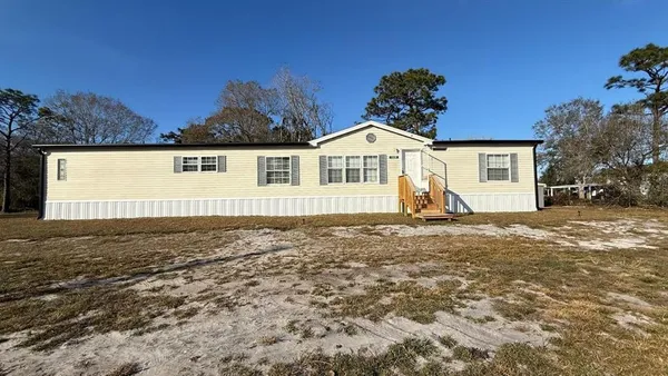 a house view with a outdoor space