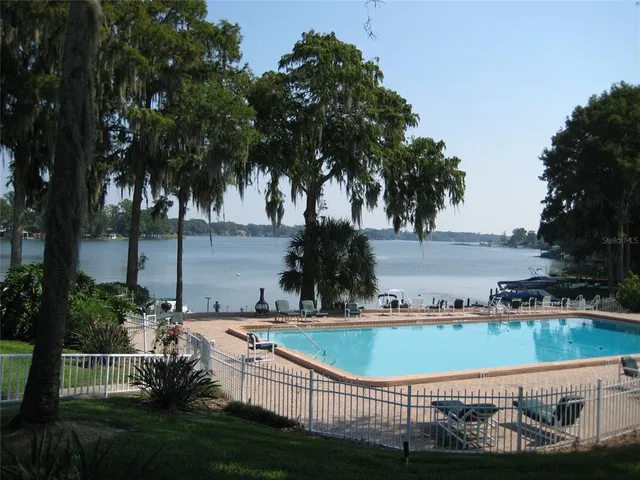 a view of a swimming pool and outdoor space
