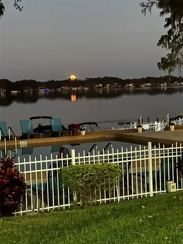 a view of a balcony with lake view