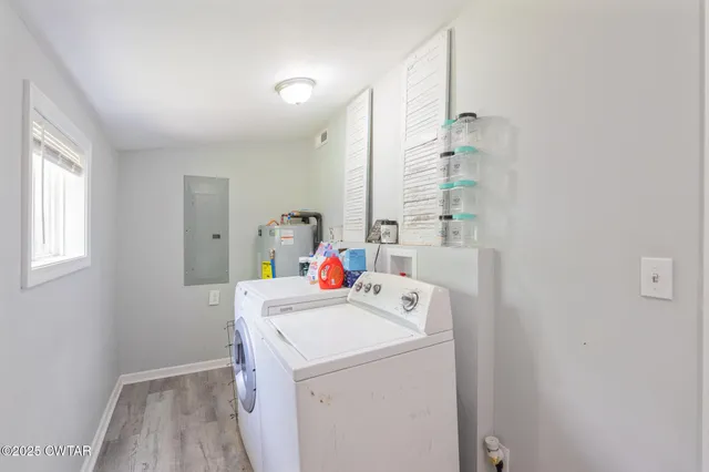 a storage room with washer and dryer