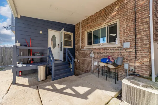 a building outdoor space with patio furniture