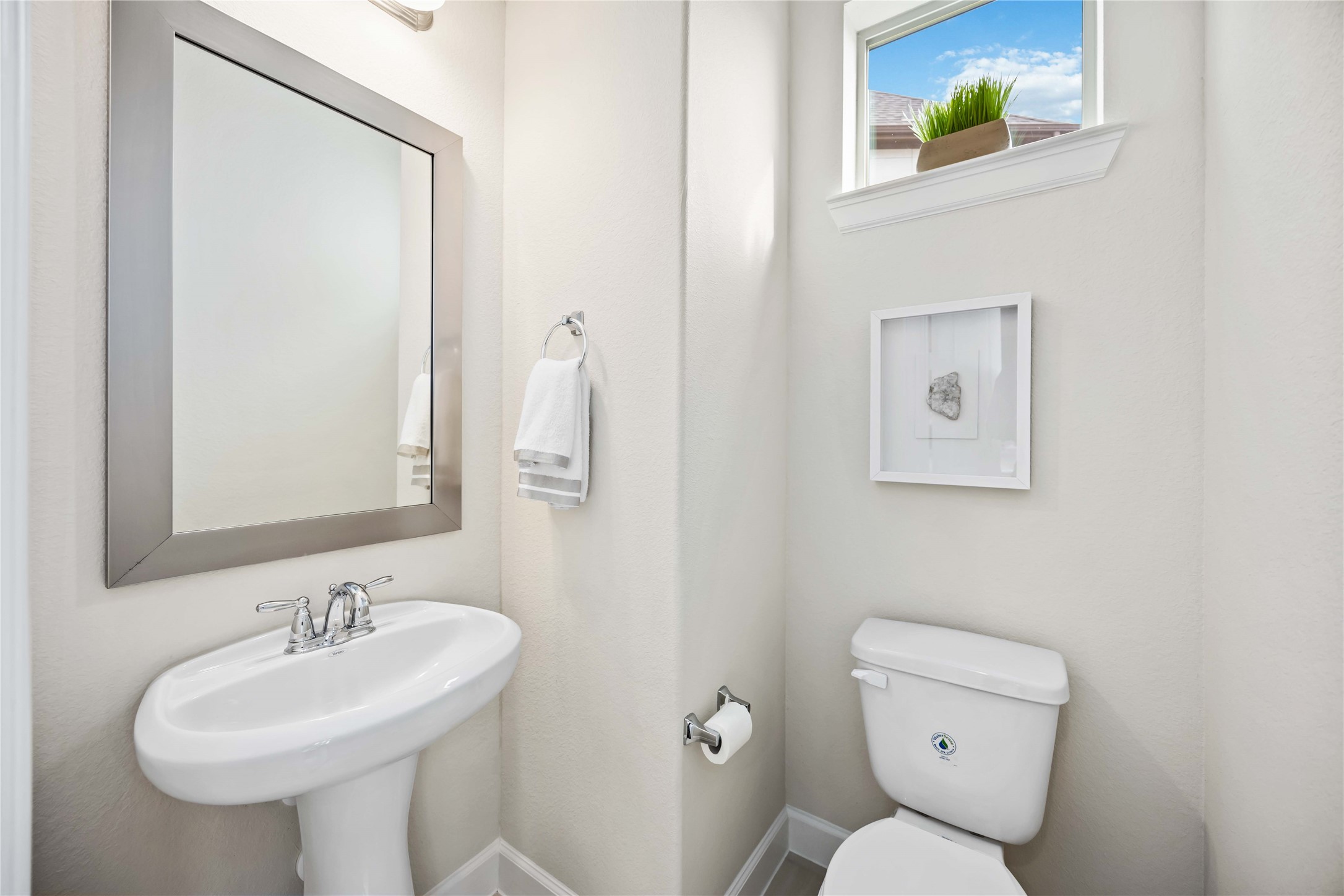 2004 Round Table Trail Houston, TX 77045 - Photo 5 of 20 Effortless elegance in this compact powder room. Clean lines and a calming palette.