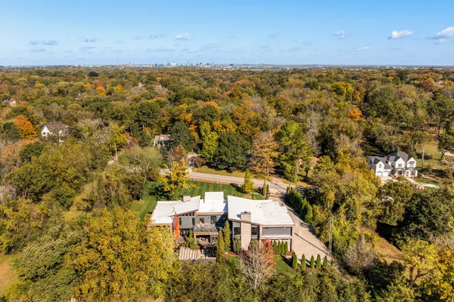 a view of swimming pool with a patio