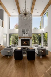 a living room with furniture or couch and a large window