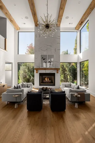 a living room with furniture or couch and a large window