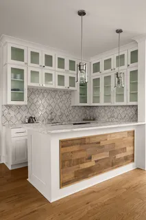 a view of a dining room that has a table and chairs