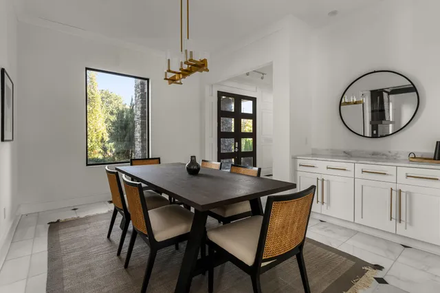 a workspace with furniture and a window