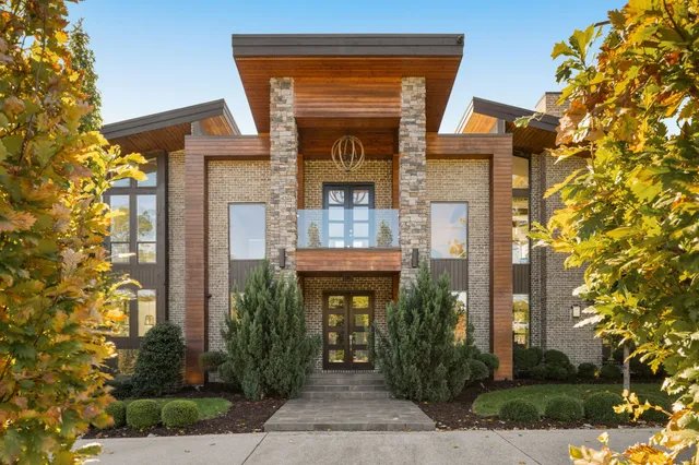 a view of residential houses with outdoor space