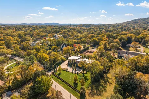 a view of a city with mountains in the background