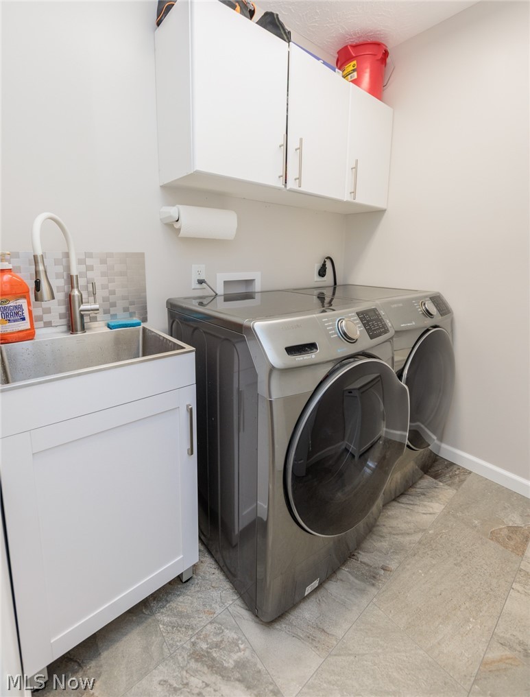 4511 Ranchwood Road Akron, OH 44333 - Photo 25 of 38 First floor laundry room