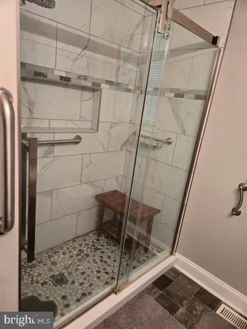 a en suite bathroom with a toilet sink