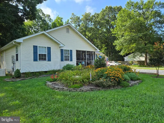 a view of a pathway of a wooden building