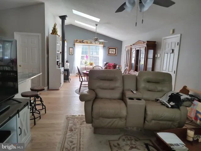 a bedroom with bed and window