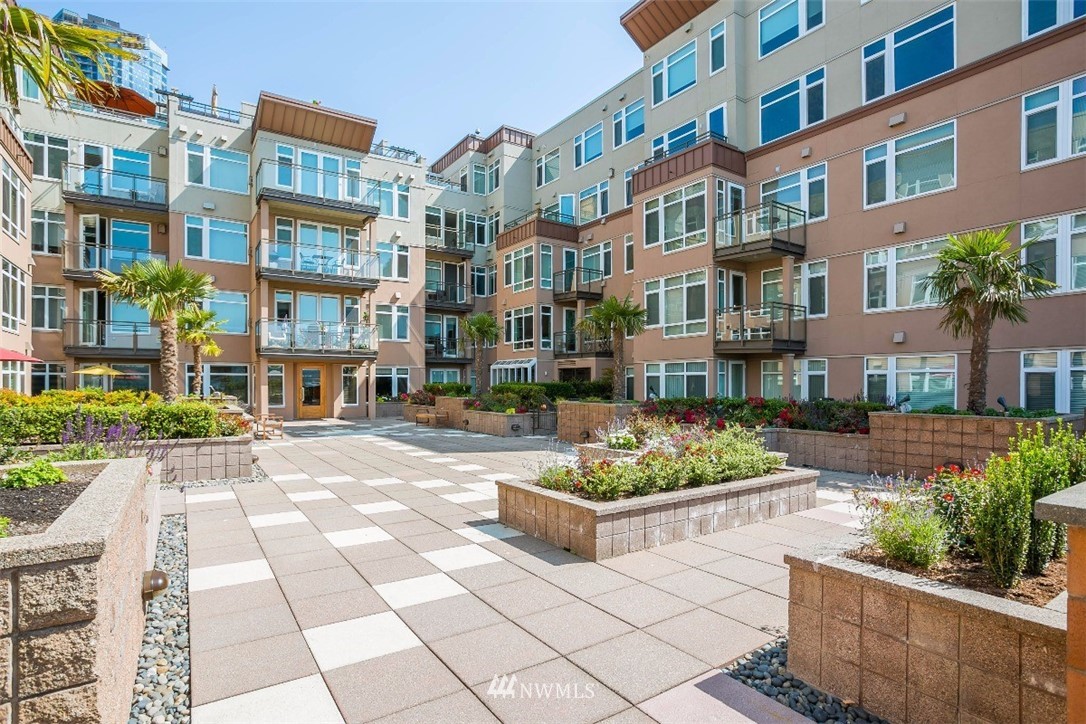 a view of a building with a garden