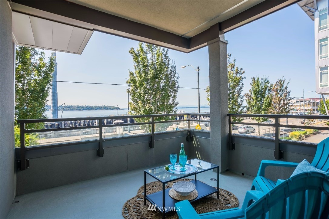 2000 Alaskan Way, Unit 257 Seattle, WA 98121 - Photo 11 of 25 a dining table with chairs and window