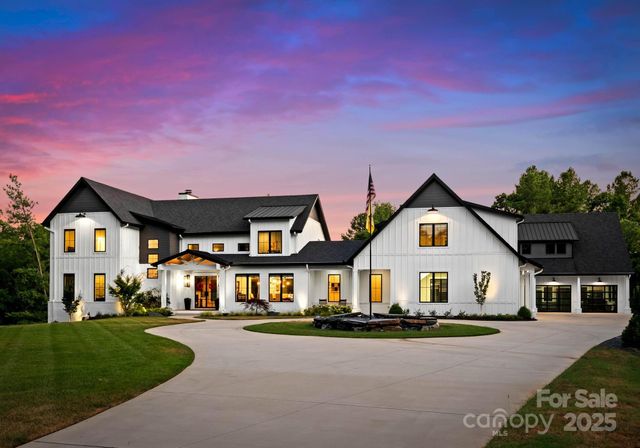 a view of house with yard and street view