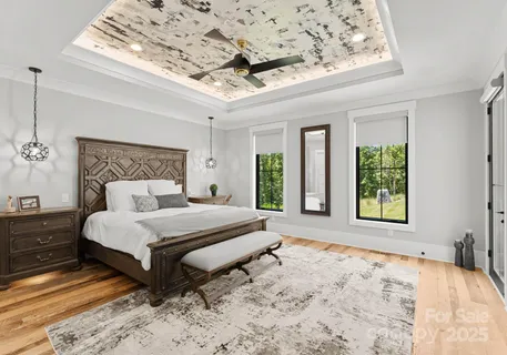 a spacious bedroom with a large bed and a window