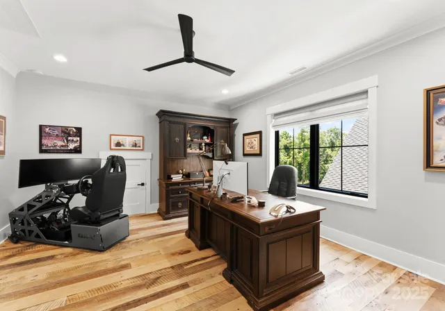 a bed room with furniture and a window