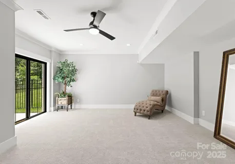 a room with furniture and a large window