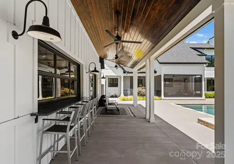 a view of a house with sitting area and furniture