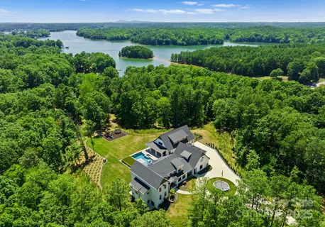 an aerial view of a house with garden