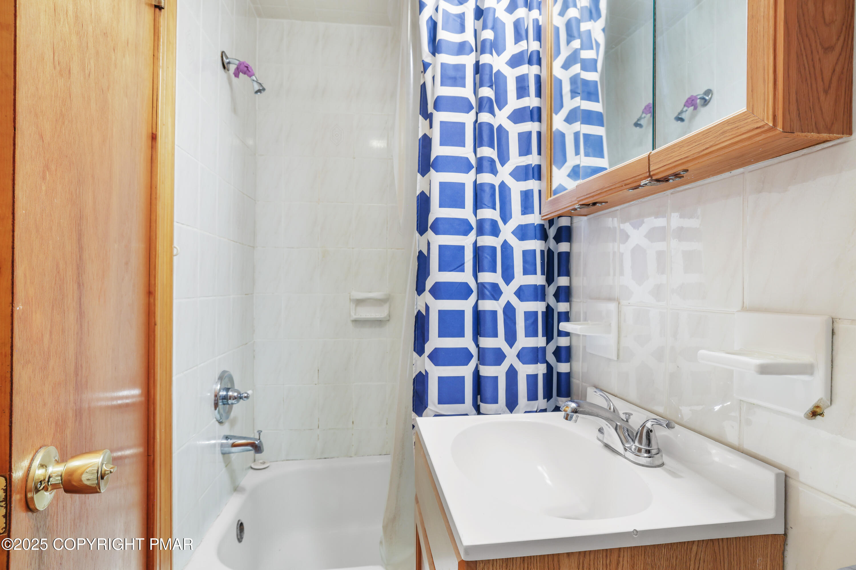 29 Reeder Street Mount Pocono, PA 18344 - Photo 23 of 50 a bathroom with a sink and a bathtub